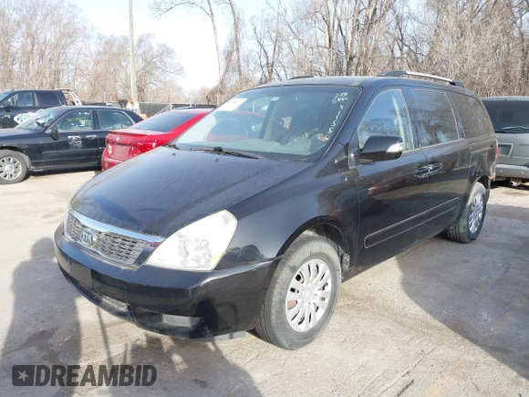 2011 Kia Sedona LX with VIN KNDMG4C70B6411556, listed as a IAAI auction lot 41768777 with 124,180 mi miles. Bid and sale history available at carsss.com. Image 2.