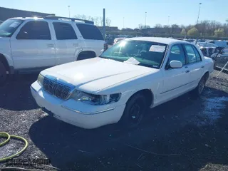 2002 Mercury Grand Marquis GS with VIN 2MEFM74W02X662931, listed as a IAAI auction lot 41806481 with 133,669 mi miles. Bid and sale history available at carsss.com. Image 2.