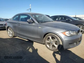 2010 BMW 1 Series 128i with VIN WBAUP9C54AVL89302, listed as a Copart auction lot 76716114 with 65,882 mi miles and Salvage Title. Bid and sale history available at DreamBid. Image 4.