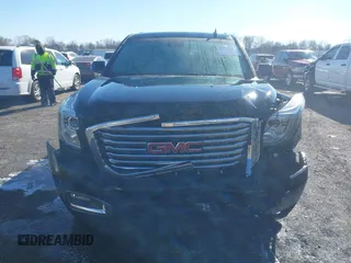 2016 GMC Yukon XL SLT with VIN 1GKS2GKC0GR443634, listed as a IAAI auction lot 41379064 with 121,744 mi miles. Bid and sale history available at carsss.com. Image 12.
