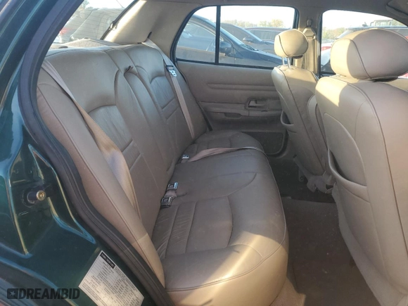 2000 Ford Crown Victoria LX with VIN 2FAFP74W9YX146624, listed as a Copart auction lot 77495074 with 167,594 mi miles and Salvage Title. Bid and sale history available at carsss.com. Image 10.