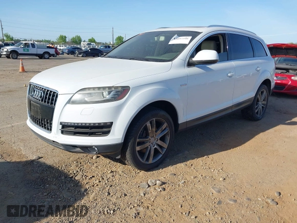 2013 Audi Q7 Premium Plus with VIN WA1LGAFE9DD011184, listed as a IAAI auction lot 42097346 with 148,786 mi miles and . Bid and sale history available at DreamBid. Image 2.