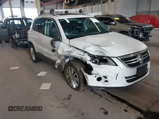 2011 Volkswagen Tiguan SE with VIN WVGBV7AX8BW504581, listed as a IAAI auction lot 42022251 with 130,785 mi miles and . Bid and sale history available at DreamBid. Image 1.