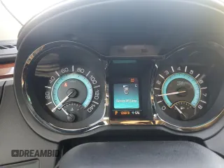 2012 Buick LaCrosse Premium 1 z VIN 1G4GD5E3XCF335041, wystawiony jako Copart lot #54889695 z przebiegiem 128 818 mil mil oraz Szkoda całkowita • Salvage title. Historia ofert i sprzedaży dostępna na DreamBid. Obrazek 9.