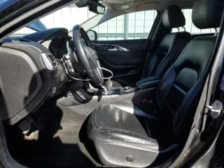 2017 Infiniti QX30 Premium with VIN SJKCH5CR0HA026923, listed as a Copart auction lot 55284585 with 114,868 mi miles and Salvage title. Bid and sale history available at DreamBid. Image 7.