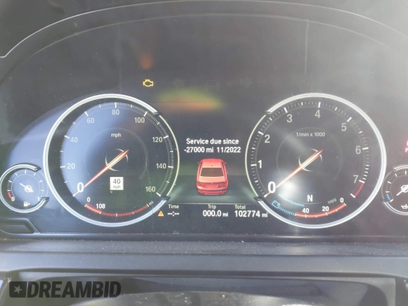 2015 BMW 7 Series 750Li with VIN WBAYE8C52FD780902, listed as a IAAI auction lot 40808265 with 102,774 mi miles. Bid and sale history available at carsss.com. Image 7.