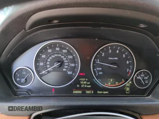 2014 BMW 4 Series 428i xDrive with VIN WBA3N5C5XEK197125, listed as a Copart auction lot 61823835 with 206,902 mi miles and Salvage title. Bid and sale history available at DreamBid. Image 9.