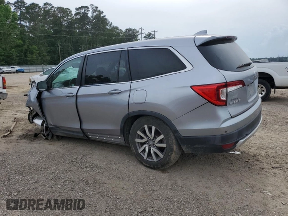 2021 Honda Pilot EX-L with VIN 5FNYF5H54MB018989, listed as a Copart auction lot 55721405 with 121,359 mi miles and Salvage Title. Bid and sale history available at carsss.com. Image 2.