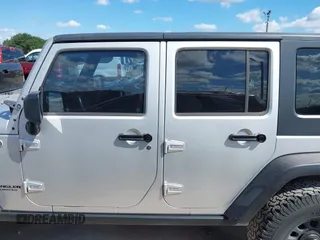 2008 Jeep Wrangler Unlimited Rubicon with VIN 1J4GA69178L550598, listed as a IAAI auction lot 42232887 with 99,637 mi miles and . Bid and sale history available at carsss.com. Image 14.