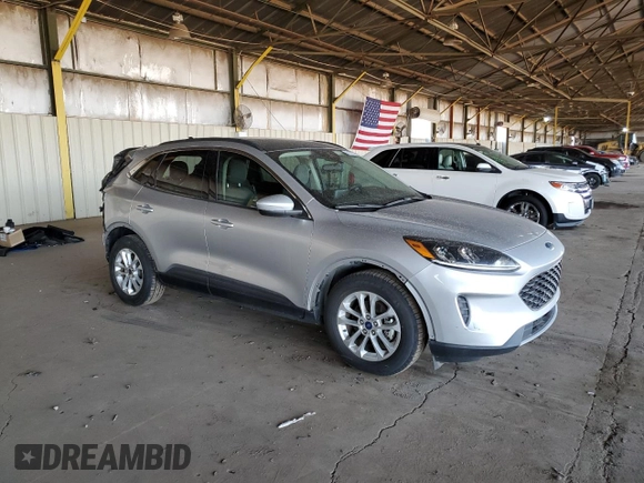 2020 Ford Escape SE with VIN 1FMCU0G60LUC25023, listed as a Copart auction lot 52728735 with 112,966 mi miles and Salvage title. Bid and sale history available at DreamBid. Image 4.