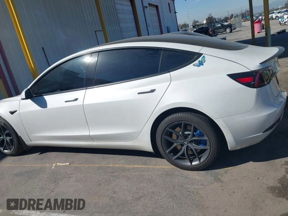 2020 Tesla Model 3 Standard Range Plus with VIN 5YJ3E1EA1LF659765, listed as a IAAI auction lot 41834411 with 42,433 mi miles and . Bid and sale history available at carsss.com. Image 14.