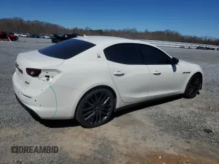 2019 Maserati Ghibli с VIN ZAM57XSA5K1335540, выставлен на аукционе Copart как лот 41641315 с пробегом 51 273 миль миль и Списание • Salvage title. История ставок и продаж доступна на DreamBid. Изображение 3.