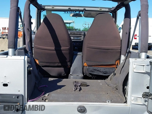 2002 Jeep Wrangler X with VIN 1J4FA39S42P763835, listed as a IAAI auction lot 42302645 with 233,634 mi miles and . Bid and sale history available at DreamBid. Image 8.