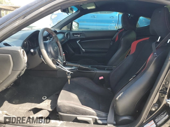 2014 Scion FR-S z VIN JF1ZNAA1XE8707871, wystawiony jako Copart lot #57945695 z przebiegiem 140 517 mil mil oraz Czysty tytuł • Clean title. Historia ofert i sprzedaży dostępna na DreamBid. Obrazek 7.