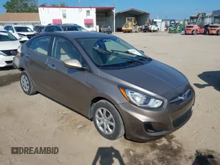 2012 Hyundai Accent GLS with VIN KMHCT4AE4CU097413, listed as a IAAI auction lot 42024571 with 120,672 mi miles. Bid and sale history available at carsss.com. Image 1.