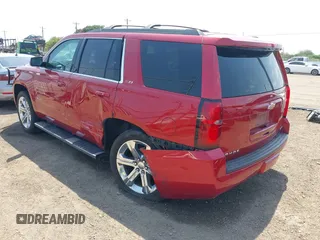 2015 Chevrolet Tahoe LT with VIN 1GNSKBKC6FR628355, listed as a IAAI auction lot 42159743 with 95,730 mi miles and . Bid and sale history available at DreamBid. Image 3.