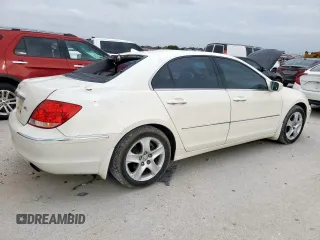 2006 Acura RL with VIN JH4KB16596C010835, listed as a Copart auction lot 54593615 with 253,575 mi miles and Salvage Title. Bid and sale history available at DreamBid. Image 3.