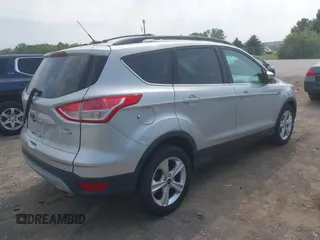 2014 Ford Escape SE z VIN 1FMCU9GX3EUB83978, wystawiony jako IAAI lot #42509549 z przebiegiem 121 388 mil mil oraz . Historia ofert i sprzedaży dostępna na DreamBid. Obrazek 4.