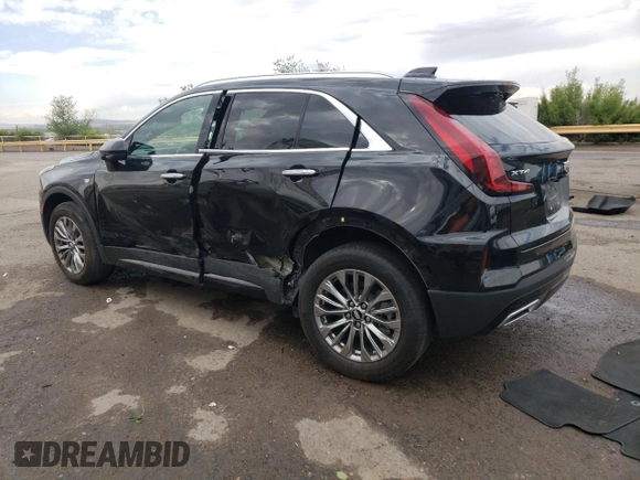 2024 Cadillac XT4 FWD Premium Luxury z VIN 1GYFZCR43RF221412, wystawiony jako Copart lot #55507885 z przebiegiem 23 702 mil mil oraz Tytuł czysty. Historia ofert i sprzedaży dostępna na DreamBid. Obrazek 2.