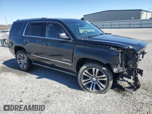 2015 GMC Yukon Denali with VIN 1GKS2CKJ5FR612147, listed as a Copart auction lot 49209525 with 127,262 mi miles and Salvage Title. Bid and sale history available at carsss.com. Image 4.