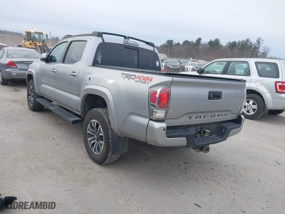 2020 Toyota Tacoma 4WD SR5 with VIN 3TMCZ5AN6LM306311, listed as a IAAI auction lot 41220025 with 67,806 mi miles. Bid and sale history available at carsss.com. Image 3.