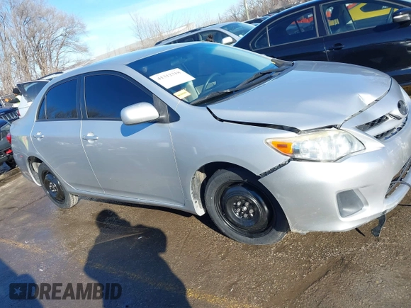 2011 Toyota Corolla L with VIN JTDBU4EE8B9167374, listed as a IAAI auction lot 41312318 with 189,903 mi miles. Bid and sale history available at carsss.com. Image 13.