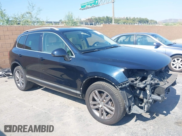 2016 Volkswagen Touareg Sport with VIN WVGEF9BP7GD010252, listed as a IAAI auction lot 42465165 with Not provided miles and . Bid and sale history available at DreamBid. Image 1.