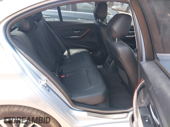 2012 BMW 3 Series 328i with VIN WBA3A5C59CF452834, listed as a IAAI auction lot 42313497 with 177,718 mi miles and . Bid and sale history available at DreamBid. Image 8.