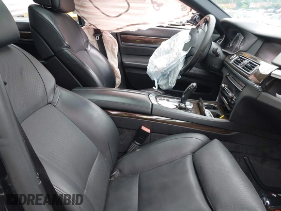 2011 BMW 7 Series 750i xDrive with VIN WBAKC6C57BC394301, listed as a IAAI auction lot 42460658 with 118,600 mi miles and . Bid and sale history available at DreamBid. Image 5.