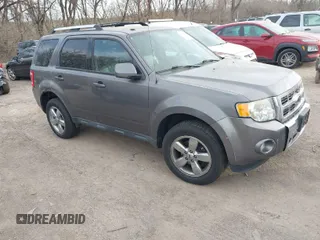 2012 Ford Escape Limited with VIN 1FMCU0E73CKB00640, listed as a IAAI auction lot 41802738 with 128,866 mi miles. Bid and sale history available at carsss.com. Image 1.