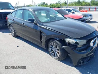 2014 BMW 3 Series GT 328i xDrive with VIN WBA3X5C51ED557347, listed as a IAAI auction lot 42028680 with 178,469 mi miles. Bid and sale history available at carsss.com. Image 6.