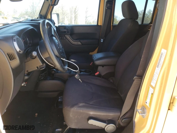 2013 Jeep Wrangler Unlimited Sport with VIN 1C4HJWDG7DL698573, listed as a Copart auction lot 49598425 with 103,029 mi miles and Salvage Title. Bid and sale history available at carsss.com. Image 7.