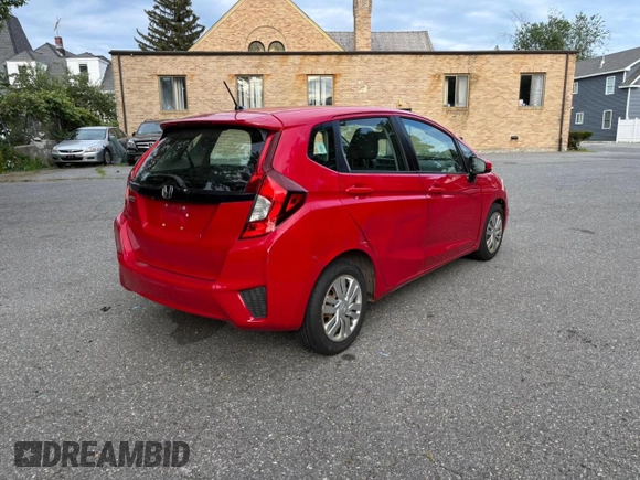 2015 Honda Fit LX with VIN 3HGGK5H50FM760104, listed as a Copart auction lot 63164915 with 118,328 mi miles and Clean title. Bid and sale history available at DreamBid. Image 4.