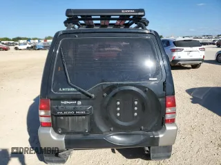 1996 Mitsubishi Montero z VIN H56A0209464, wystawiony jako Copart lot #76590414 z przebiegiem 112 578 mil mil oraz Szkoda całkowita • Salvage title. Historia ofert i sprzedaży dostępna na DreamBid. Obrazek 6.