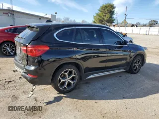 2016 BMW X1 xDrive28i z VIN WBXHT3C35G5E50005, wystawiony jako Copart lot #74476533 z przebiegiem 128 031 mil mil oraz Szkoda całkowita • Salvage title. Historia ofert i sprzedaży dostępna na DreamBid. Obrazek 3.