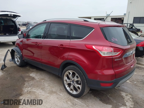 2015 Ford Escape Titanium with VIN 1FMCU0J98FUC07196, listed as a IAAI auction lot 41930660 with 51,161 mi miles and . Bid and sale history available at DreamBid. Image 3.