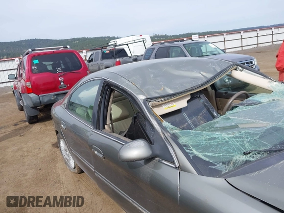 2001 Mercury Sable LS Premium with VIN 1MEFM55S71G632734, listed as a IAAI auction lot 42011855 with 211,402 mi miles and . Bid and sale history available at DreamBid. Image 12.