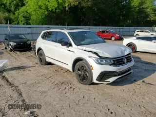 2023 Volkswagen Tiguan SE R-Line Black с VIN 3VVCB7AX6PM012271, выставлен на аукционе Copart как лот 54506175 с пробегом 28 168 миль миль и Списание • Salvage title. История ставок и продаж доступна на DreamBid. Изображение 11.