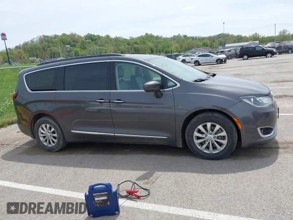 2017 Chrysler Pacifica Touring L with VIN 2C4RC1BG1HR540246, listed as a IAAI auction lot 42107768 with 151,268 mi miles and . Bid and sale history available at DreamBid. Image 13.