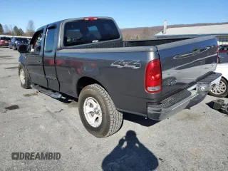 2004 Ford F-150 XL with VIN 2FTRX18W74CA39541, listed as a Copart auction lot 50390125 with Not provided miles and Salvage title. Bid and sale history available at DreamBid. Image 2.