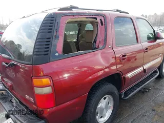 2003 GMC Yukon SLT with VIN 1GKEK13Z73R199374, listed as a IAAI auction lot 41840225 with 230,235 mi miles. Bid and sale history available at carsss.com. Image 6.