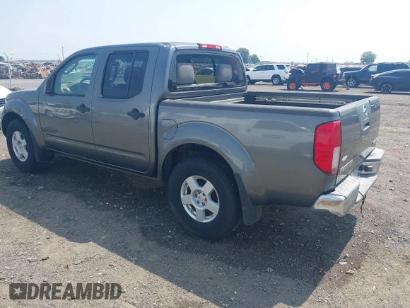 2005 Nissan Frontier LE with VIN 1N6AD07W35C438405, listed as a IAAI auction lot 42469804 with 128,472 mi miles and . Bid and sale history available at DreamBid. Image 3.