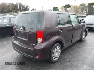 2015 Scion xB with VIN JTLZE4FE7FJ068936, listed as a IAAI auction lot 41565886 with 94,671 mi miles. Bid and sale history available at carsss.com. Image 4.