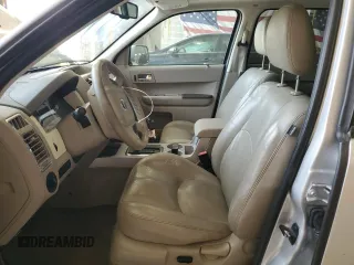 2008 Mercury Mariner Premier z VIN 4M2CU87108KJ13679, wystawiony jako Copart lot #56635785 z przebiegiem 166 732 mil mil oraz Szkody całkowita. Historia ofert i sprzedaży dostępna na DreamBid. Obrazek 7.