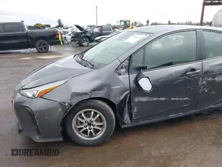 2021 Toyota Prius L Eco with VIN JTDKAMFUXM3143646, listed as a IAAI auction lot 41507110 with 207,238 mi miles. Bid and sale history available at carsss.com. Image 6.