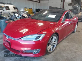 2016 Tesla Model S 90D with VIN 5YJSA1E24GF141543, listed as a IAAI auction lot 42045333 with Not Provided miles and . Bid and sale history available at DreamBid. Image 2.