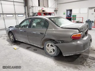 2000 Chevrolet Malibu with VIN 1G1ND52J2Y6144275, listed as a IAAI auction lot 41570948 with 230,626 mi miles. Bid and sale history available at carsss.com. Image 3.