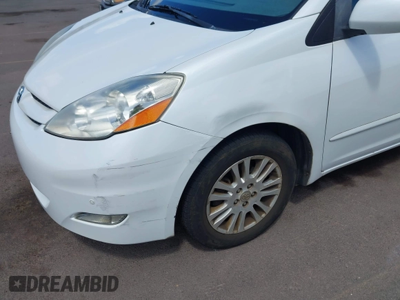 2010 Toyota Sienna XLE with VIN 5TDYK4CC7AS291119, listed as a IAAI auction lot 41742917 with 201,590 mi miles. Bid and sale history available at carsss.com. Image 6.