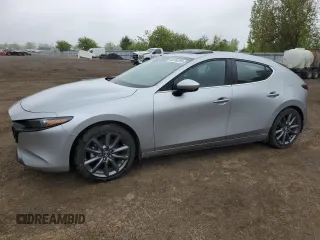 2021 Mazda 3 Premium z VIN JM1BPAML5M1333468, wystawiony jako Copart lot #58780295 z przebiegiem 54 386 mil mil oraz Szkoda całkowita • Salvage title. Historia ofert i sprzedaży dostępna na DreamBid. Obrazek 1.