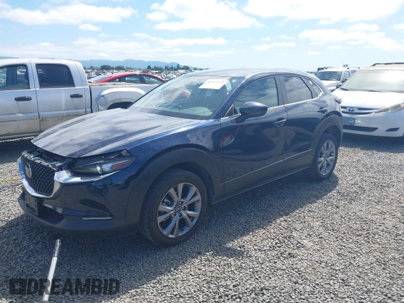 2021 Mazda CX-30 Select with VIN 3MVDMBBL6MM243726, listed as a IAAI auction lot 42353943 with 67,239 mi miles and . Bid and sale history available at DreamBid. Image 2.